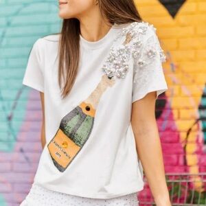 Queen of sparkles champagne top. Size medium